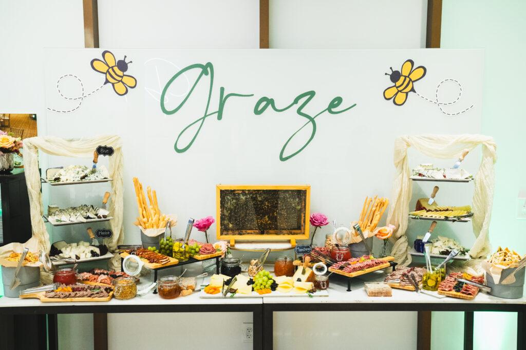 Graze table with honey and charcuterie