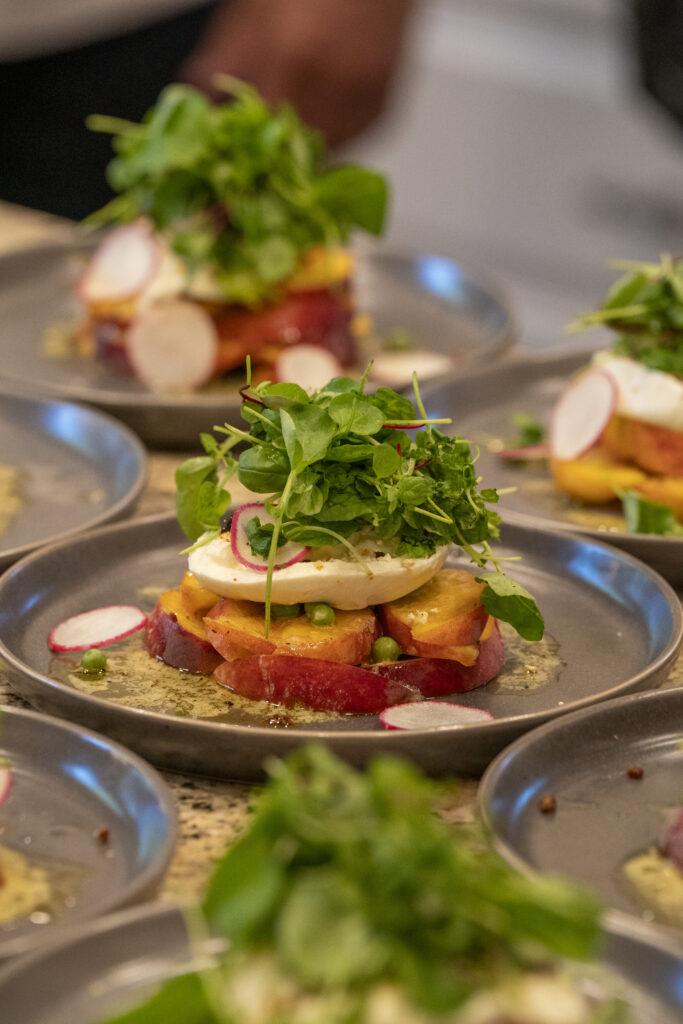 Closeup of Burrata Salad with Charred English Peas