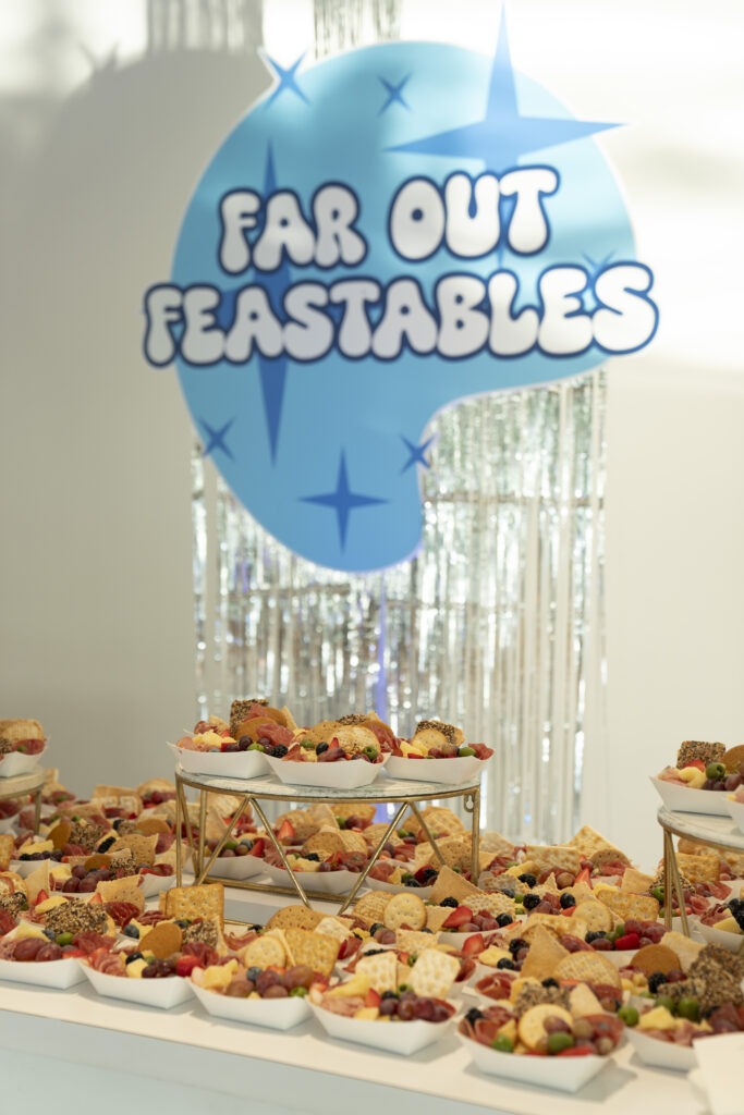 Far Out Feastables Signage